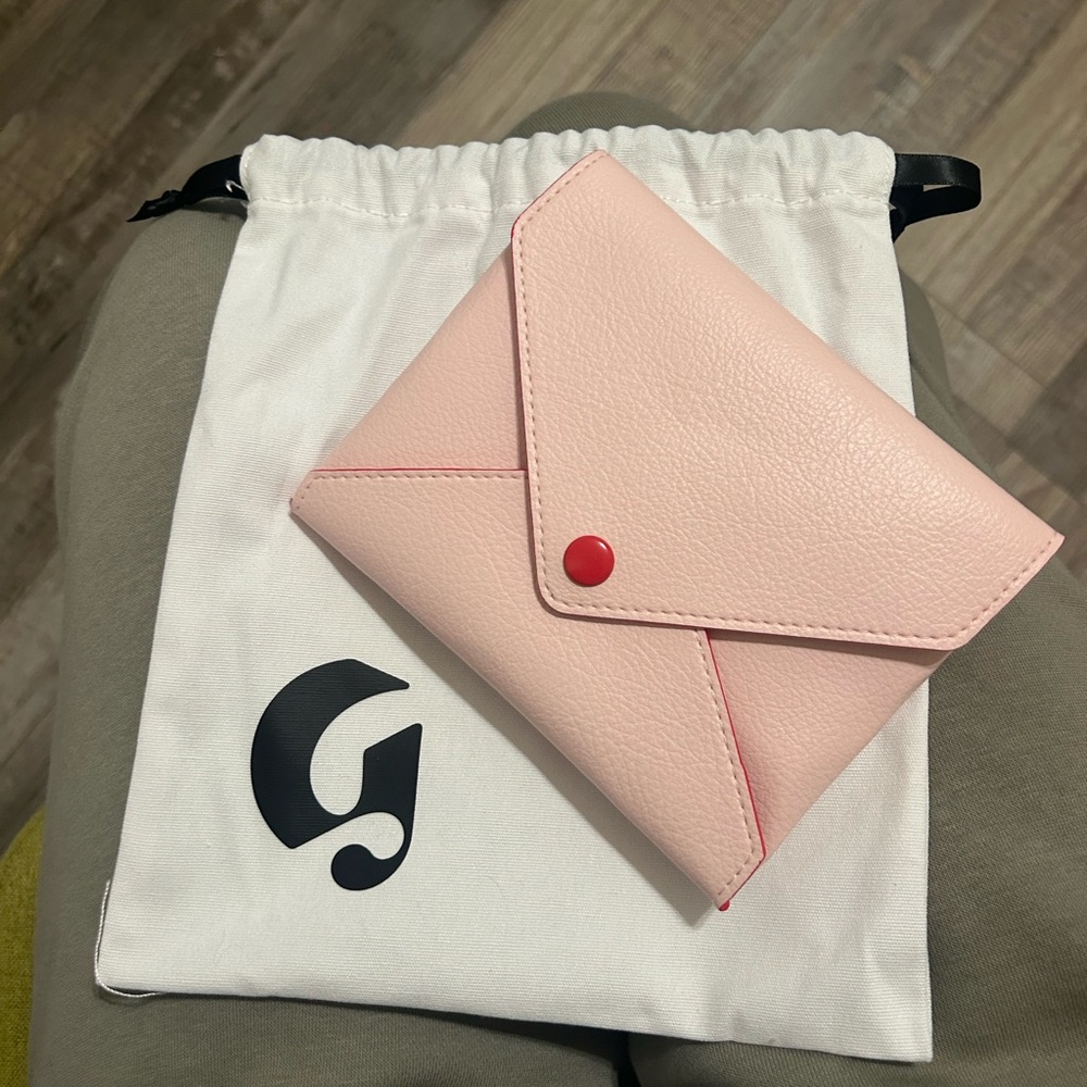 Glossier envelope pouch